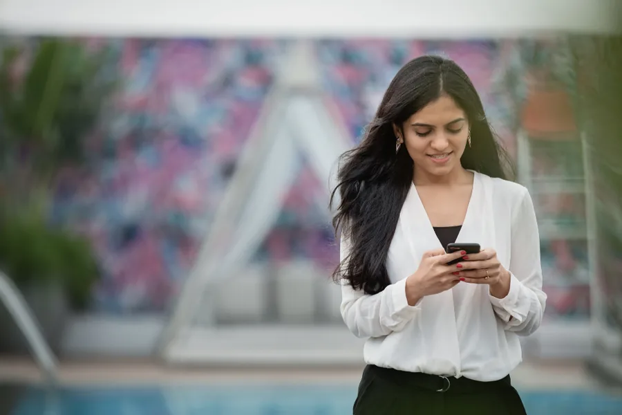 Person using their phone outdoors